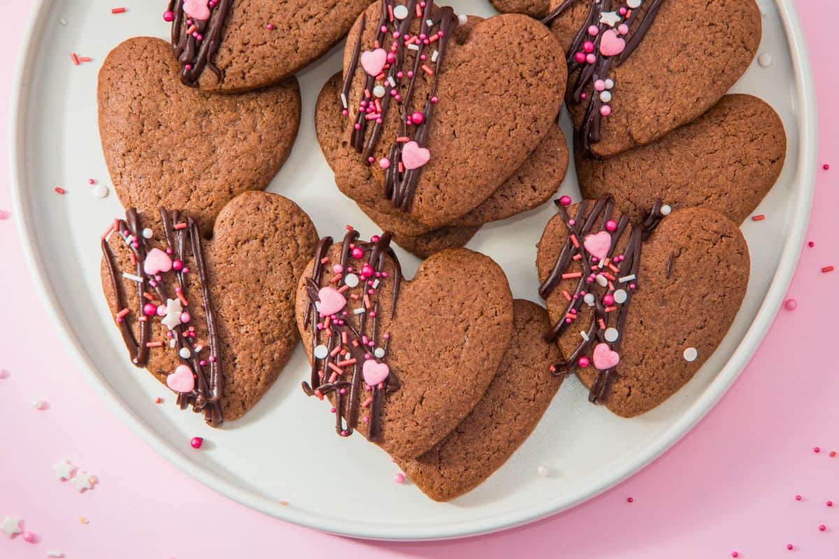 chocolate heart shaped sugar cookies on plate.