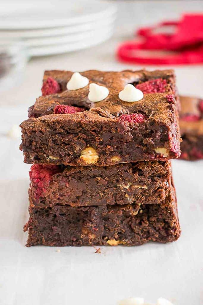 stack of triple chocolate raspberry brownies.