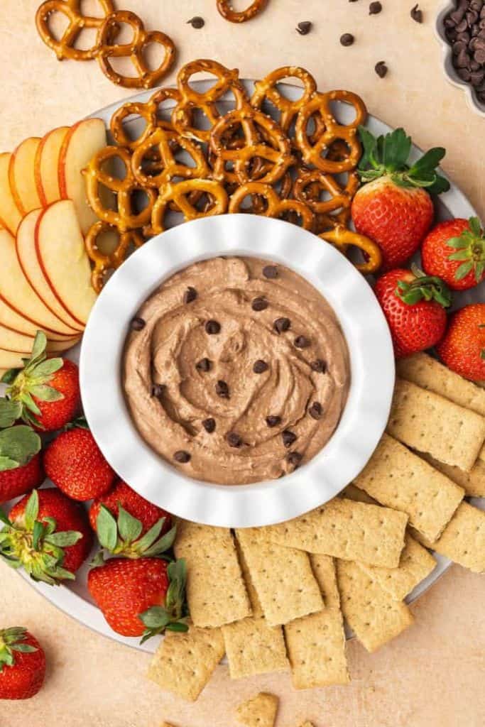 bowl of brownie dip on valentines day dessert board.