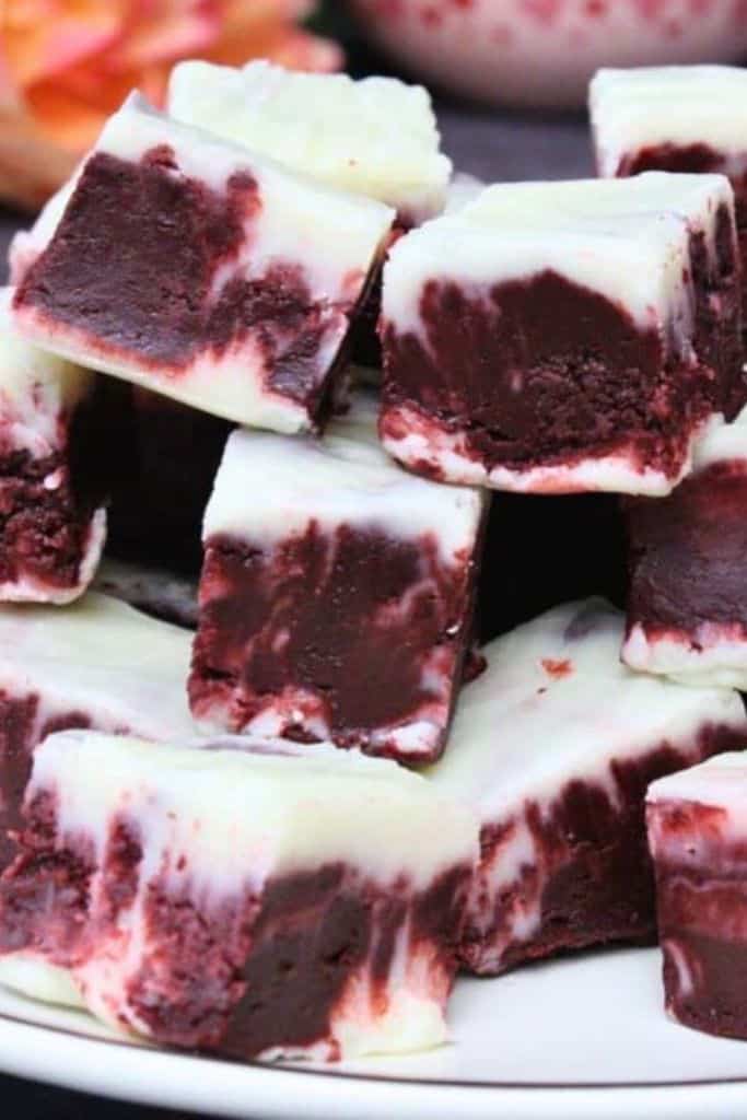stack of red velvet fudge on plate