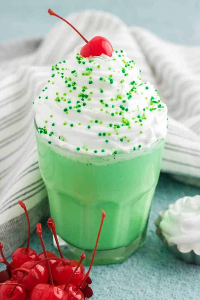 green shake with whipped cream.
