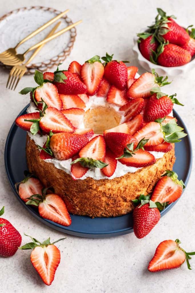angel food cake topped with fresh strawberries.