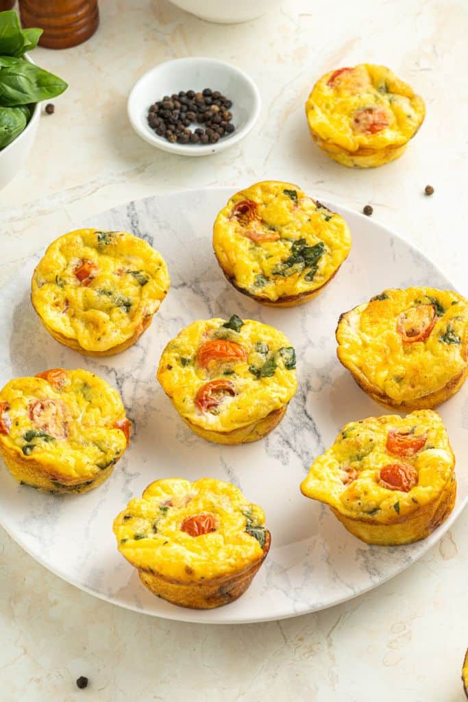 caprese egg muffins on plate.