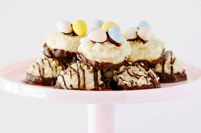 chocolate dipped macaroons with easter eggs.