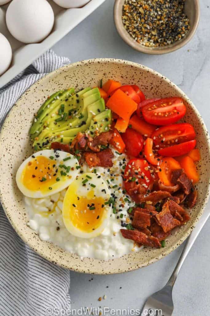 savory breakfast bowl with eggs.