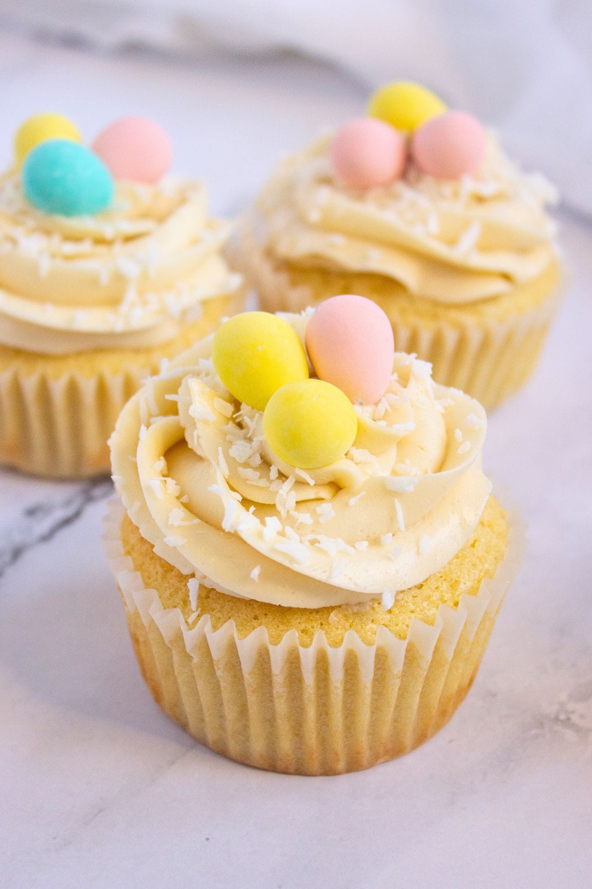 easter themed cupcakes with mini eggs.