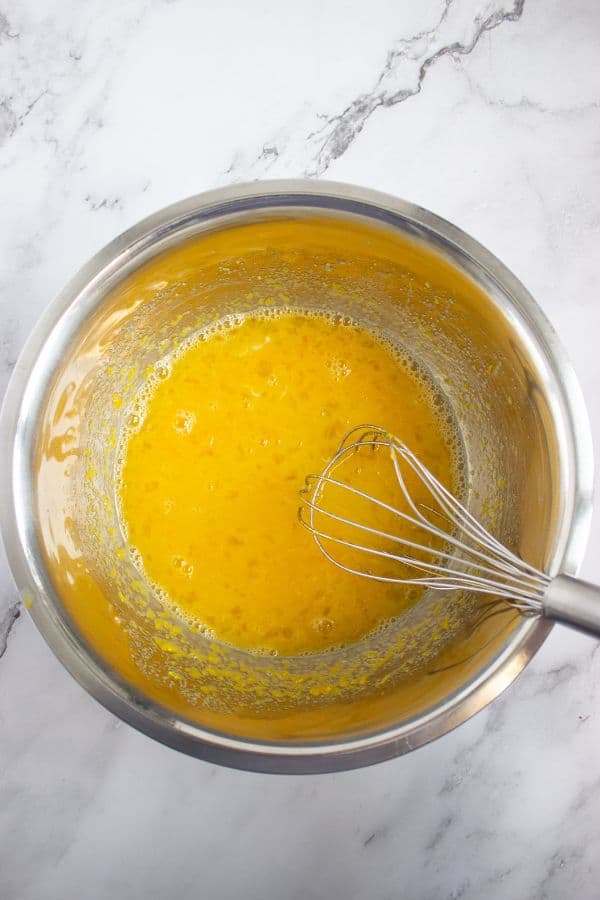 whisking lemon curd.