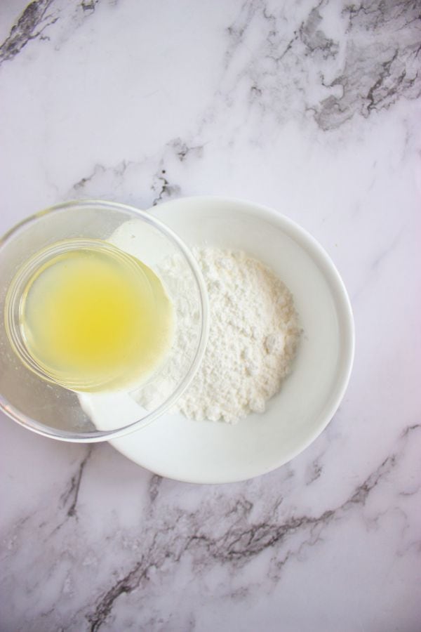 lemon glaze ingredients in bowl.