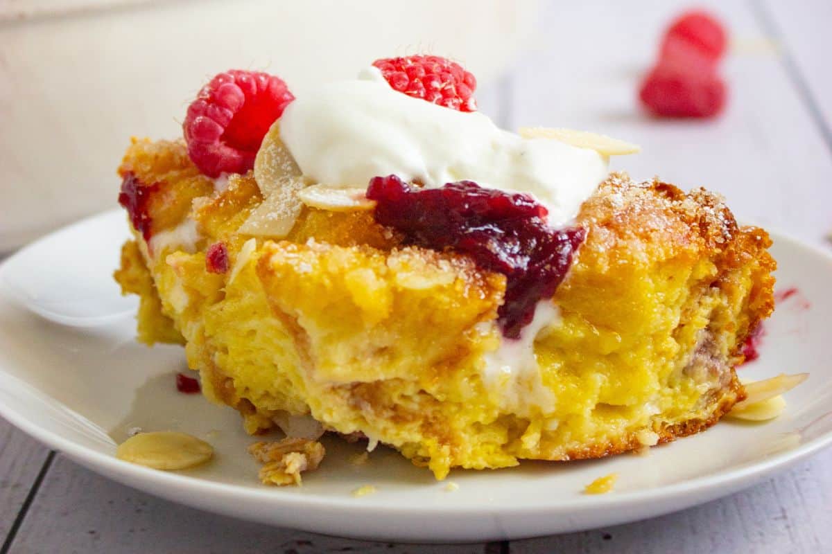 piece of berry brioche casserole on plate.