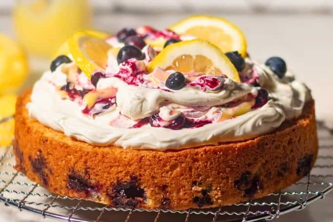 lemon blueberry mascarpone cake decorated.