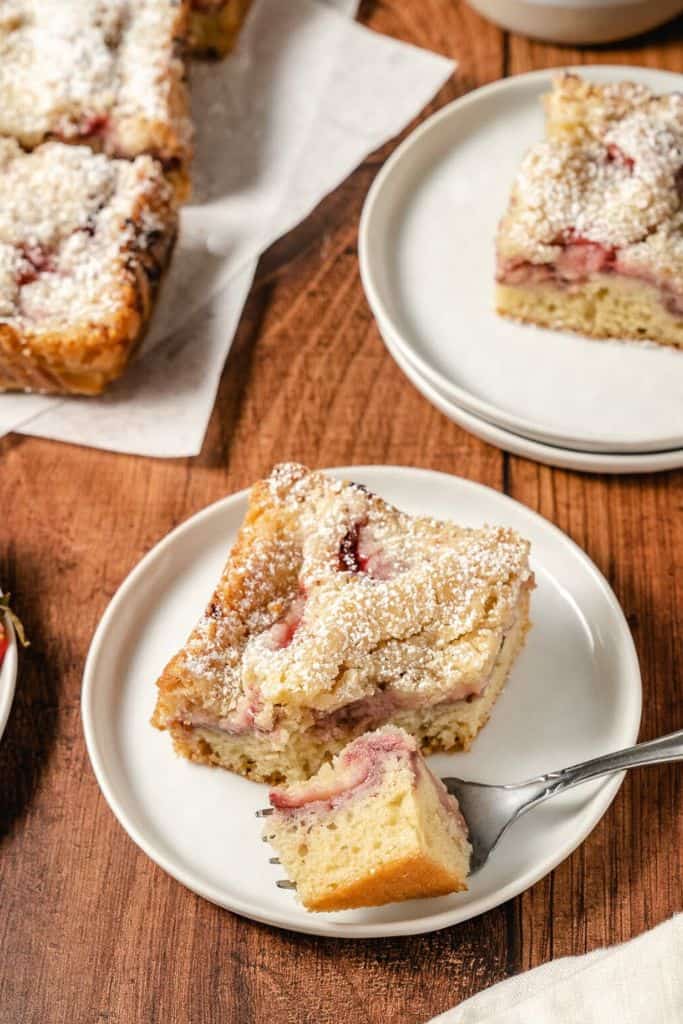 slice of strawberry coffee cake on plate.