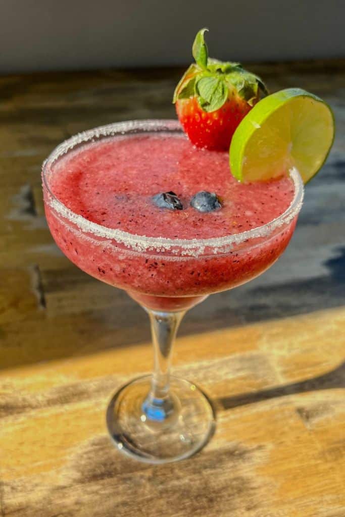 red berry margarita in glass.