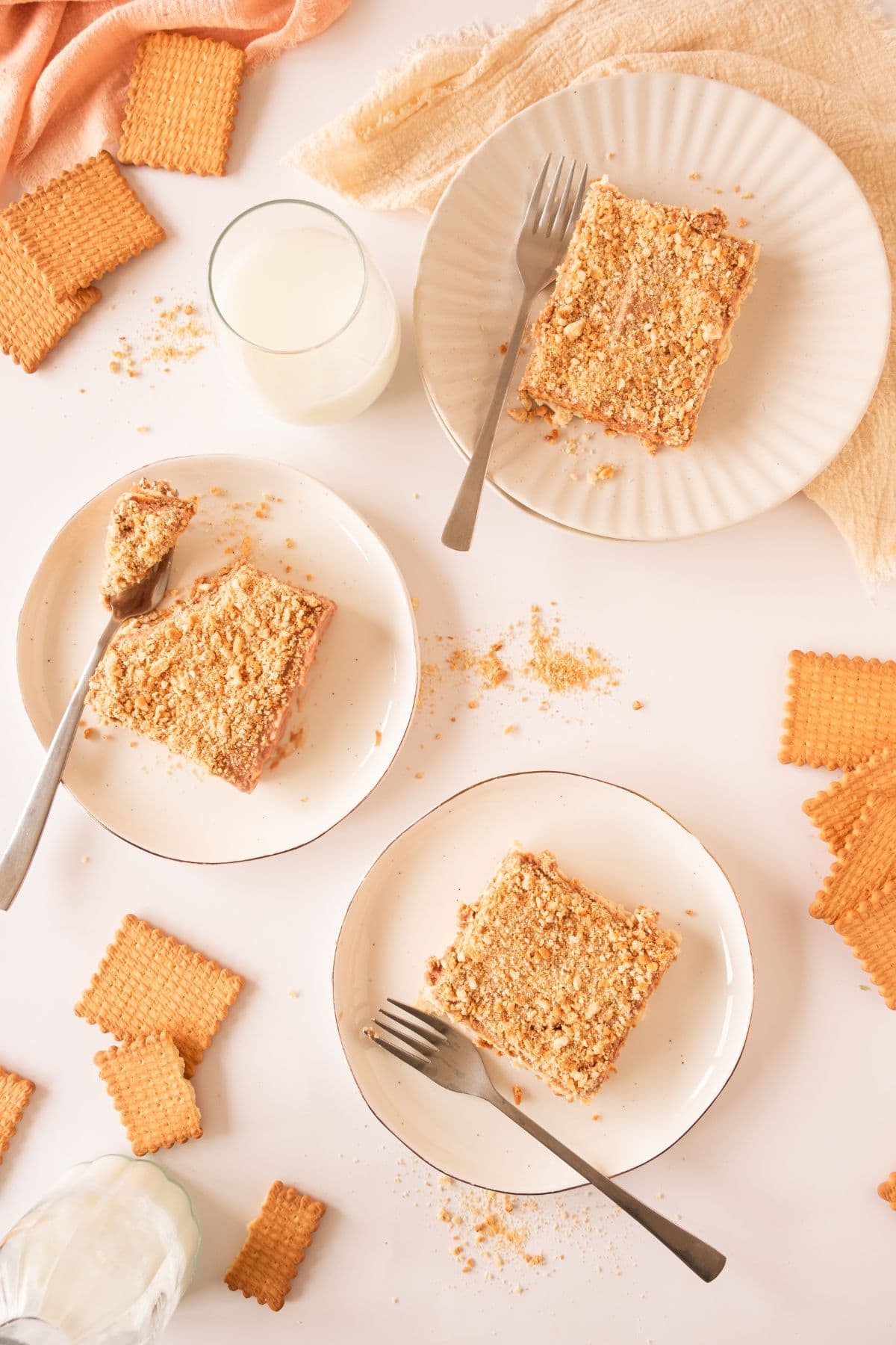 top view of plates with slice of biscoff cake and fork.