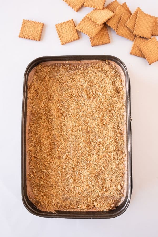 top view biscuit cake topped with crumbs.