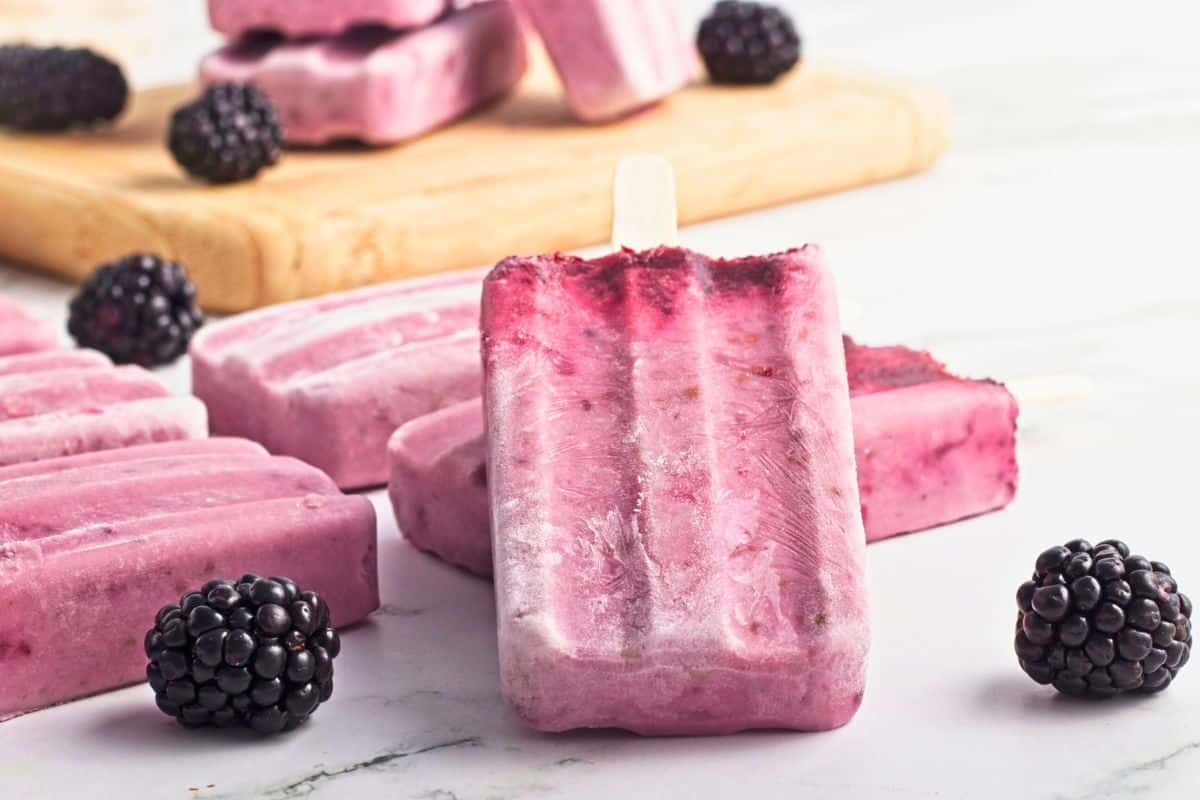 blackberry coconut milk popsicles stacked.