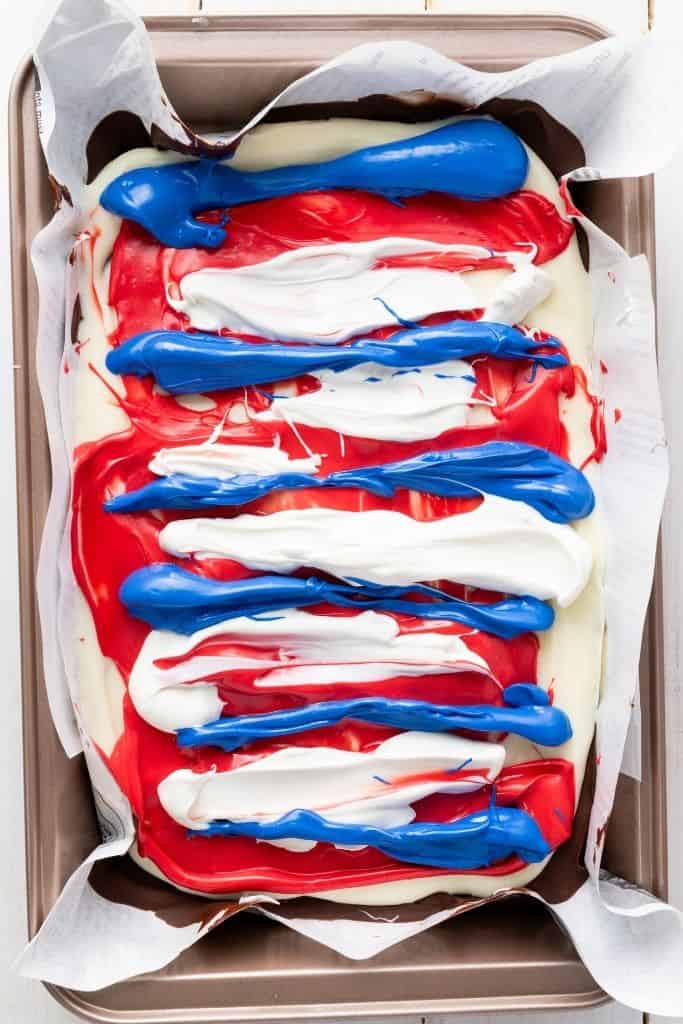 red white and blue melted chocolate on bark.