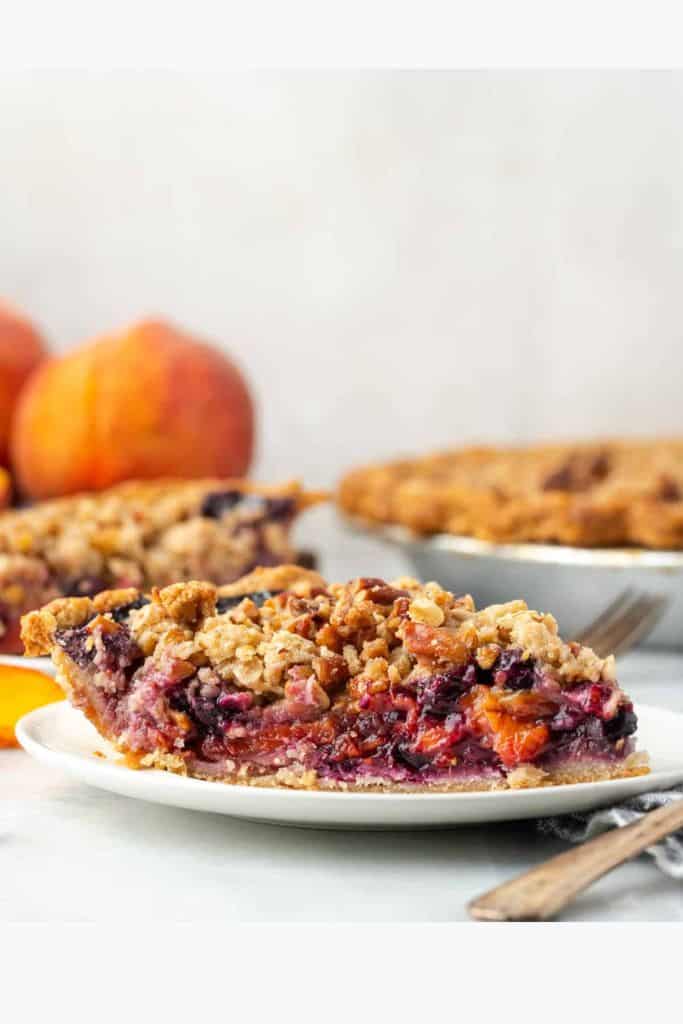 peach and blueberry pie slice.