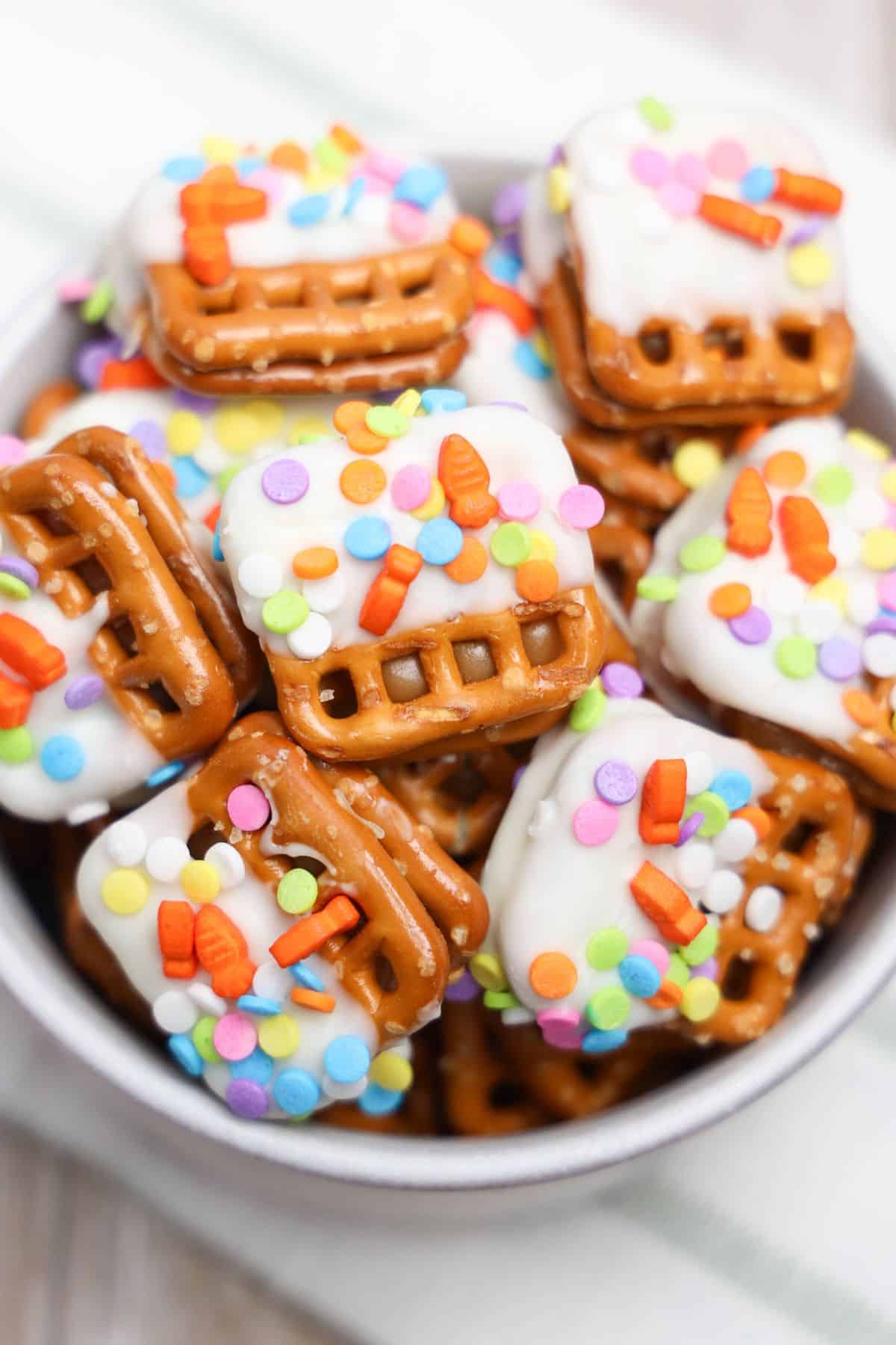 easter themed caramel pretzel treats in bowl.