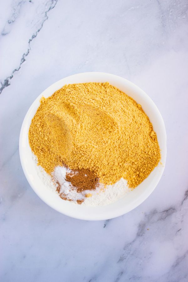 graham cracker base cookie dry ingredients in bowl.