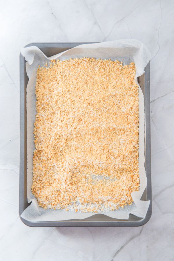 graham cracker mixture in tray.