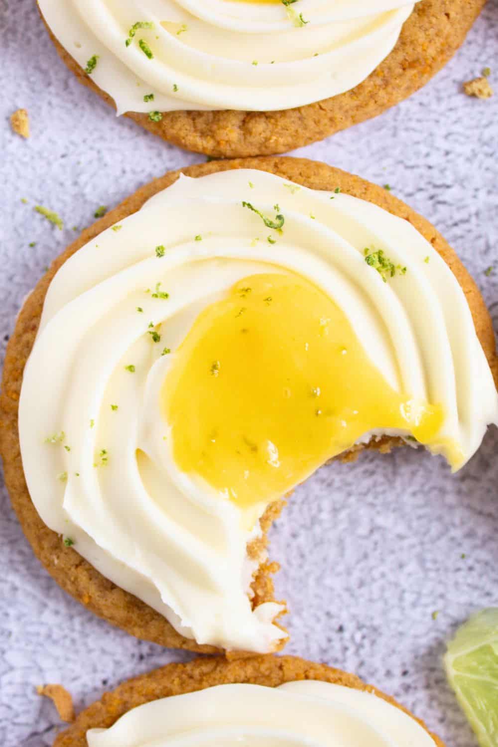 closeup of key lime cookie with cream cheese frosting and lime curd.