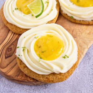 homemade key lime pie cookies on wooden board.