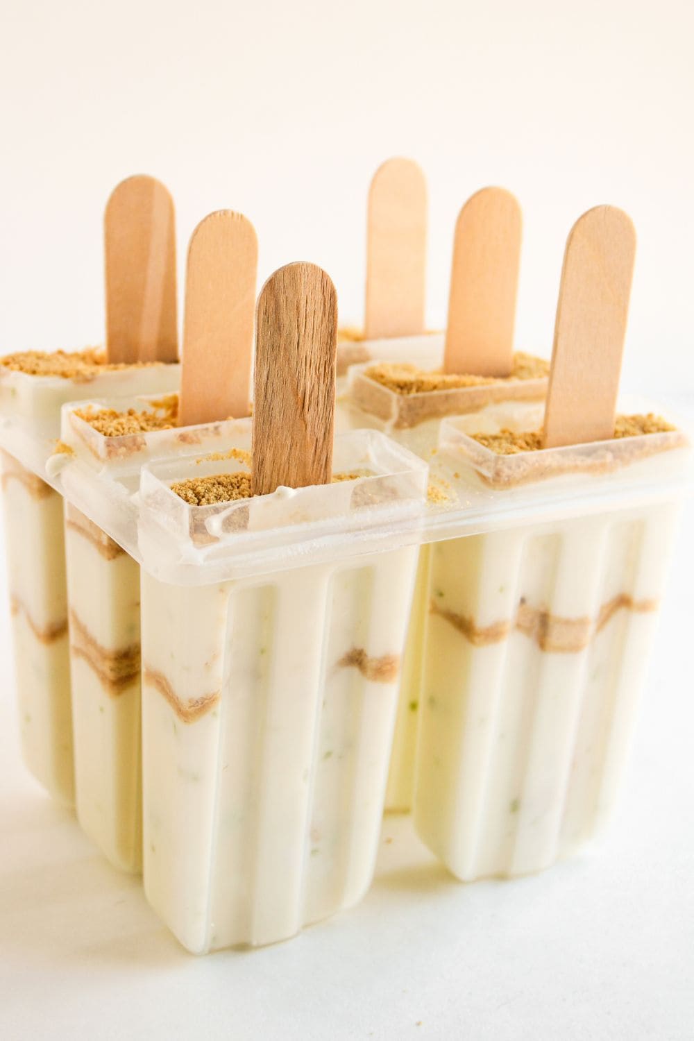 lime fruit popsicles in mold.
