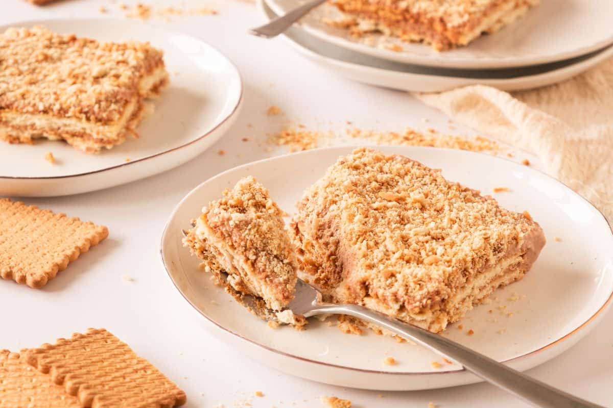 piece of lotus biscoff cake on plate.