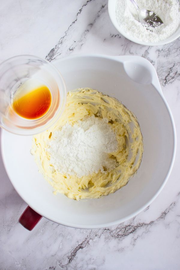 cream cheese frosting ingredients in bowl.