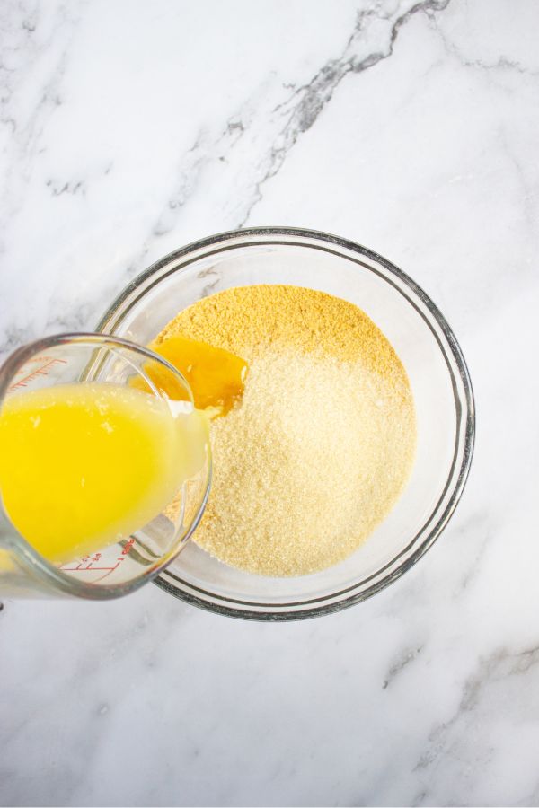 graham cracker crust ingredients in bowl.
