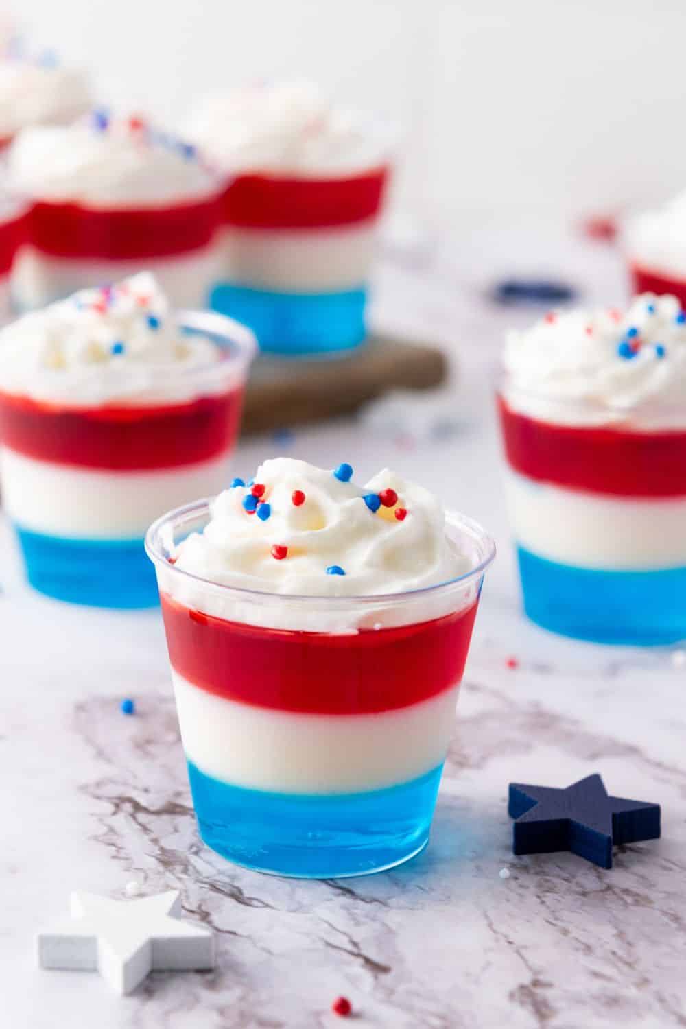 4th of july jello dessert in small dessert cups.