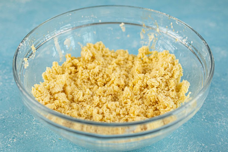 peach crumble mixture in bowl.