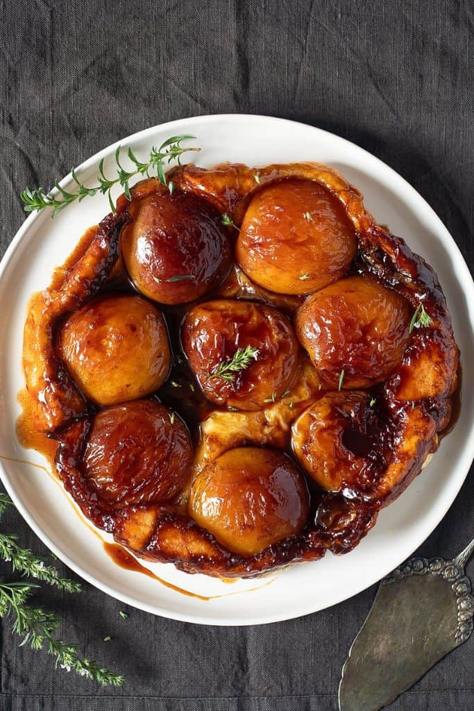 peach tarte tartin on plate.