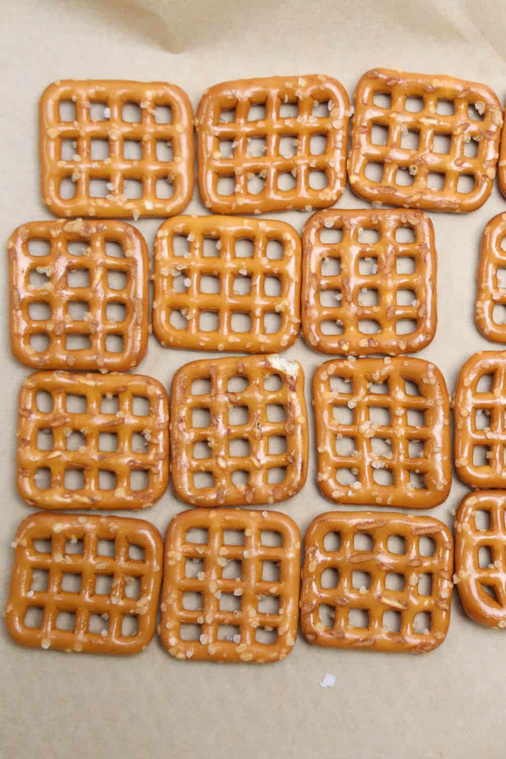 pretzel snaps on parchment paper.