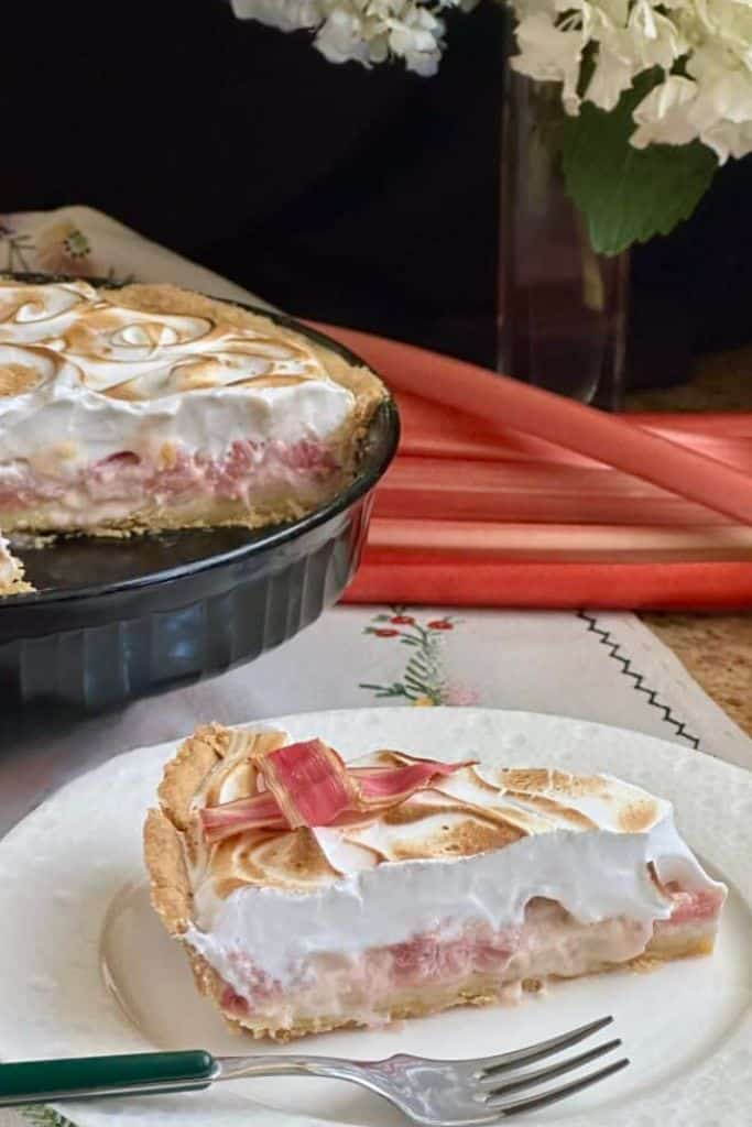 slice of rhubarb meringue tart on plate.