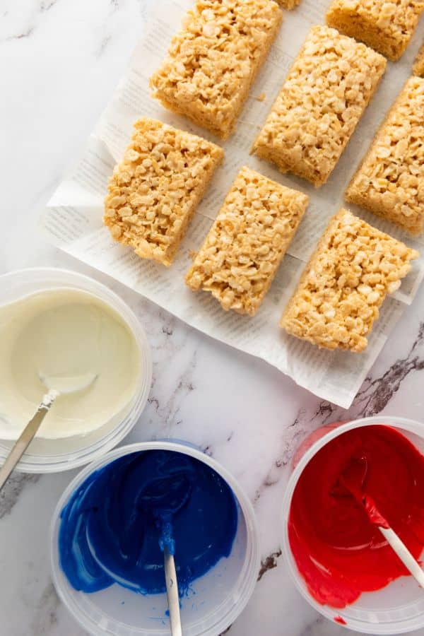 red white and blue candy melts with rice krispie bars.