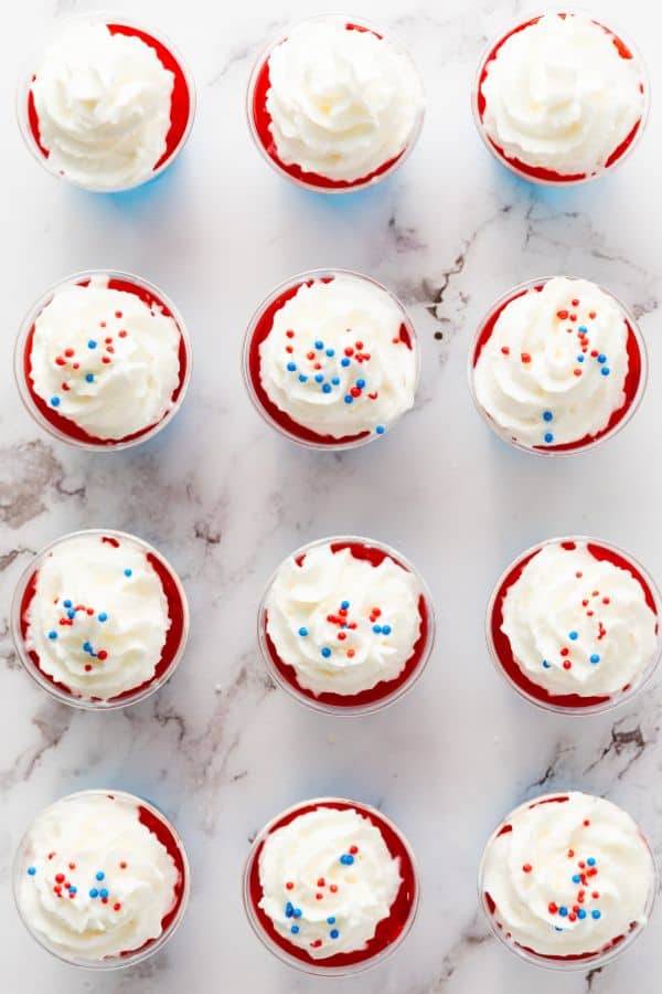 festive sprinkles on whipped cream jello cups.