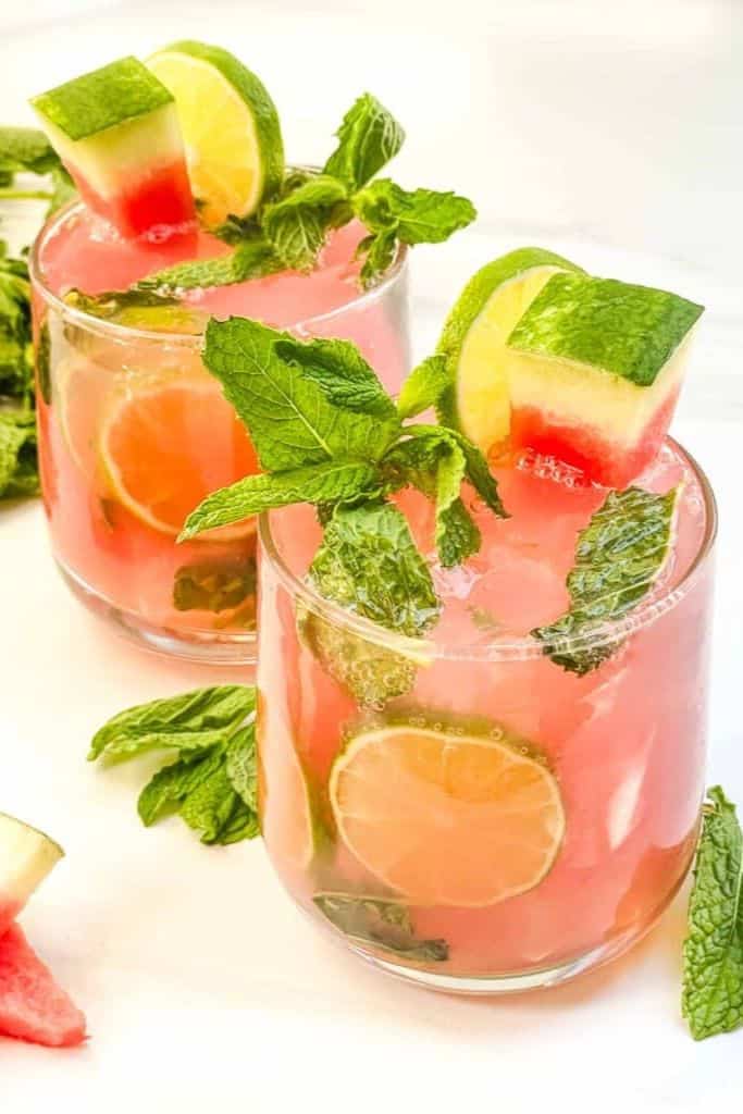 red watermelon mojito with garnish.