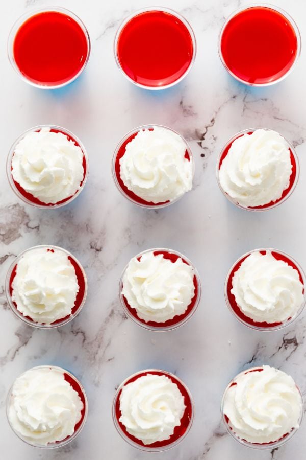 whipped cream on jello dessert cups.