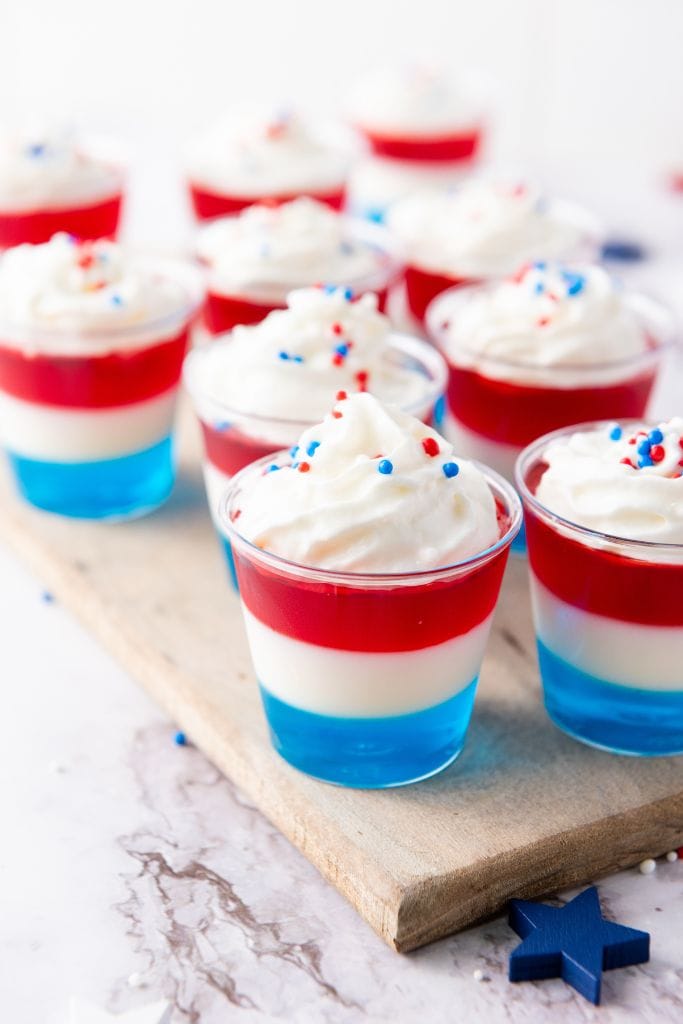 red white and blue layered jello cups.