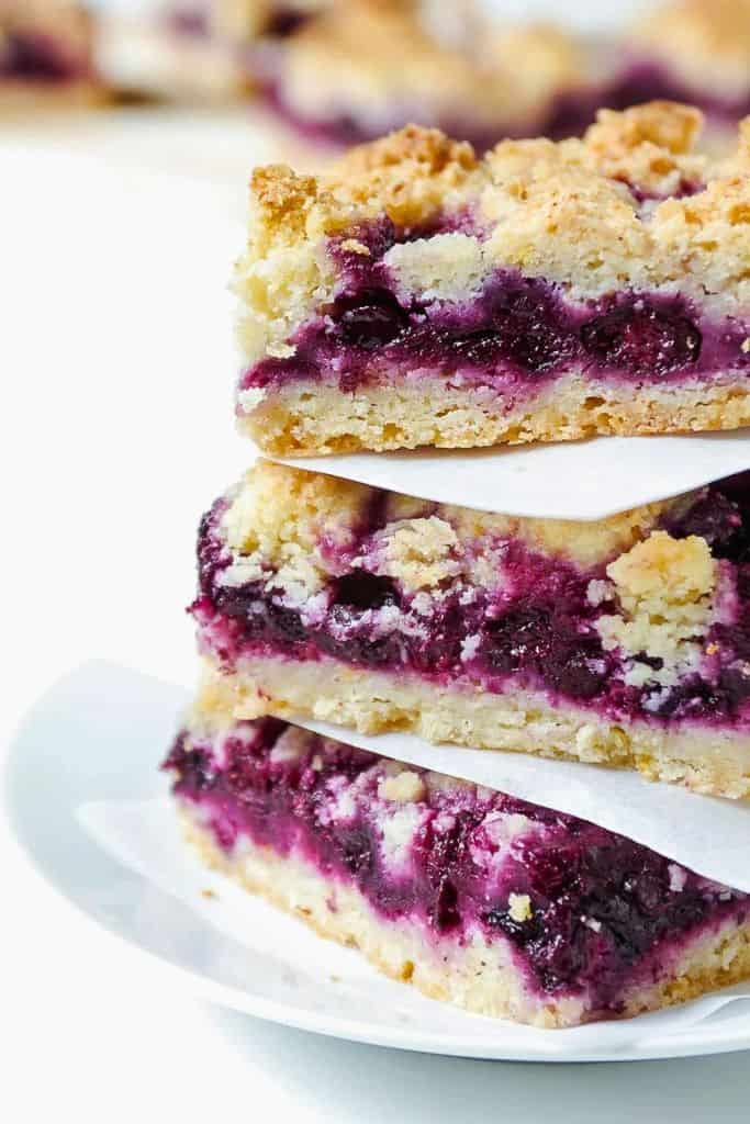 blueberry pie bars stacked.