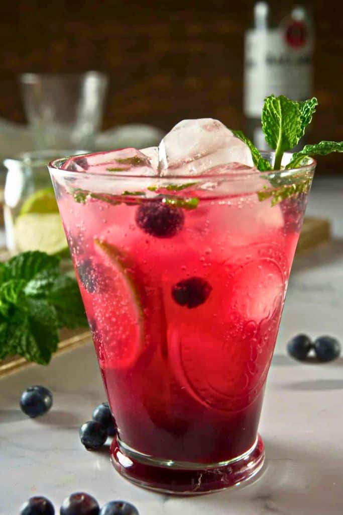 blueberry mocktail in short glass.