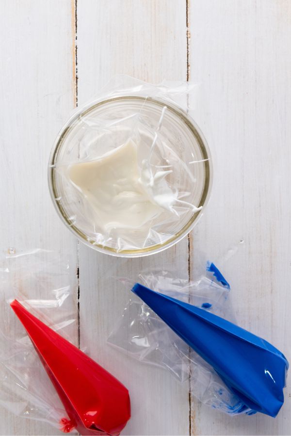 red white and blue melted candy in bags.
