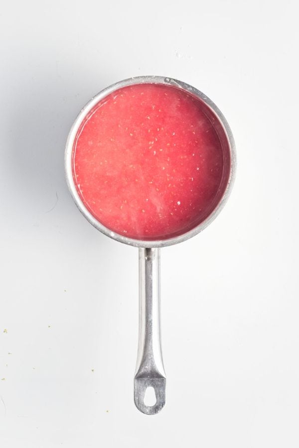 cooked raspberry mixture in pan.