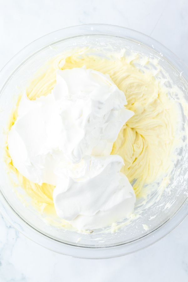 cream cheese with whipped topping in bowl.