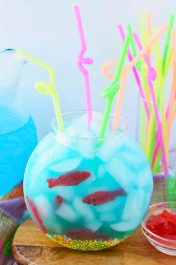 blue punch in bowl with straws.