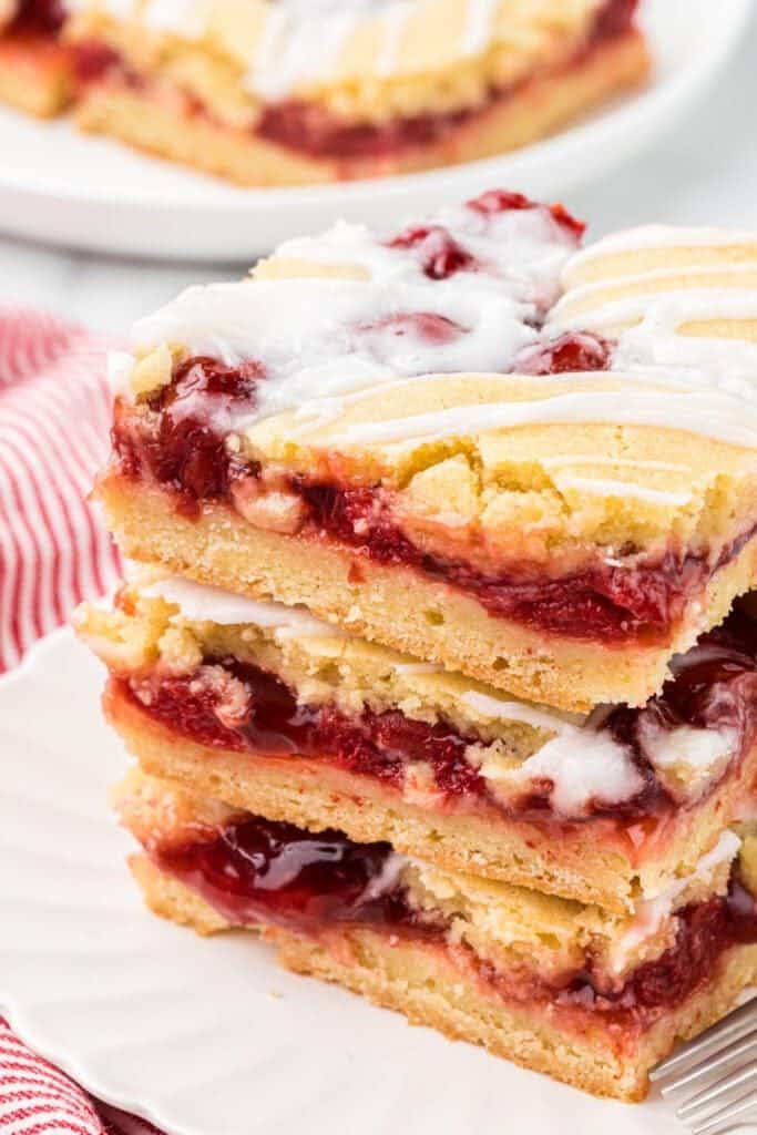 cherry dessert bars stacked.