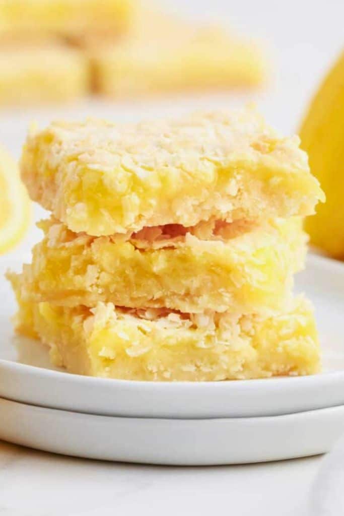 stack of coconut lemon squares.