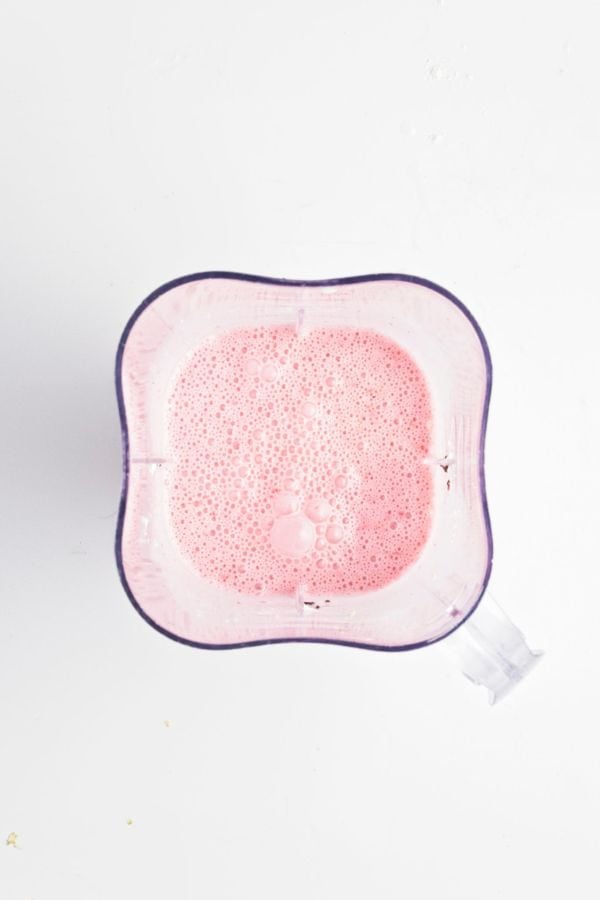 lemon raspberry mixture blended in blender.