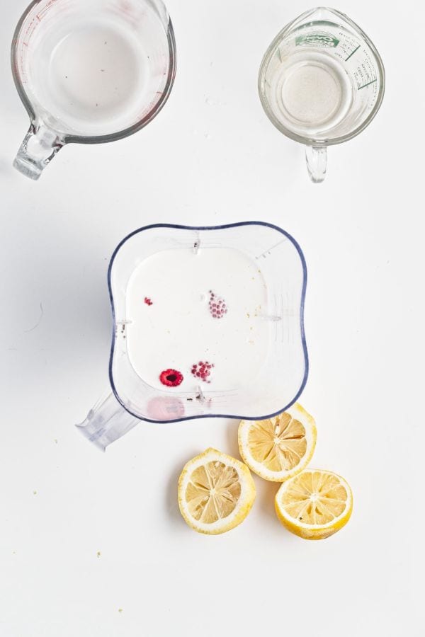 lemon raspberry curd mixture in blender.